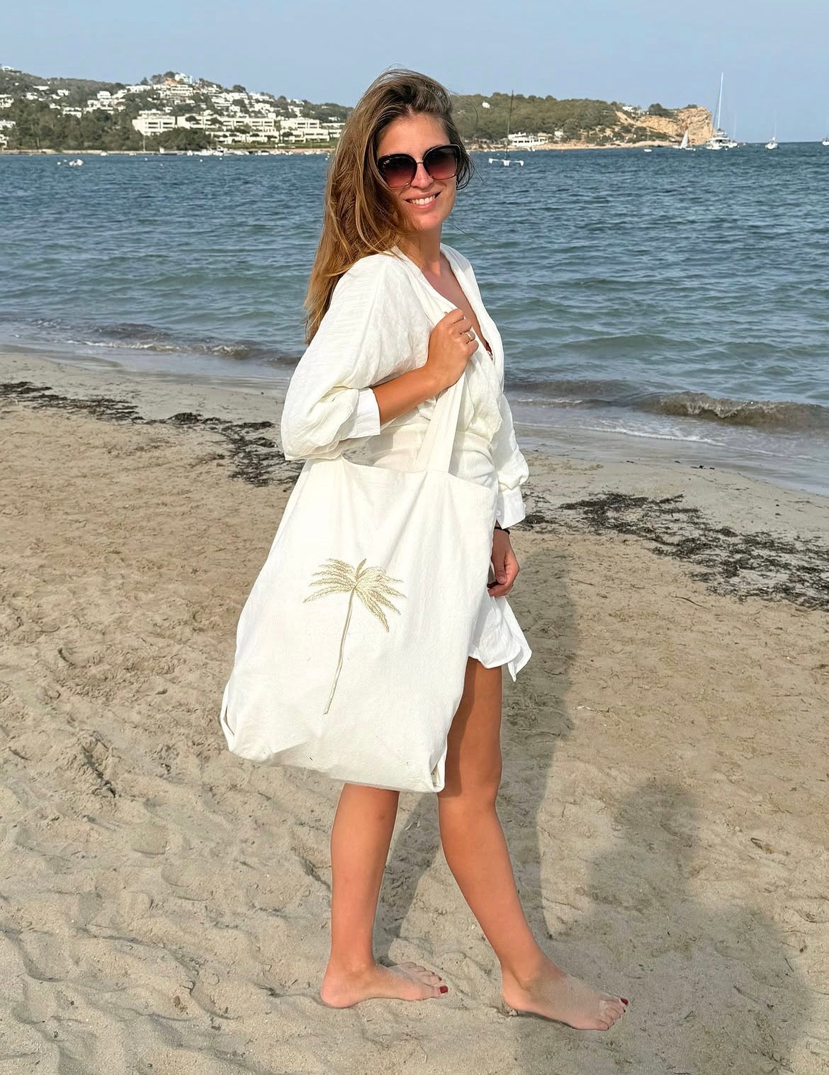 White handmade beach tote bag with gold palm embroidery — Made in Morocco