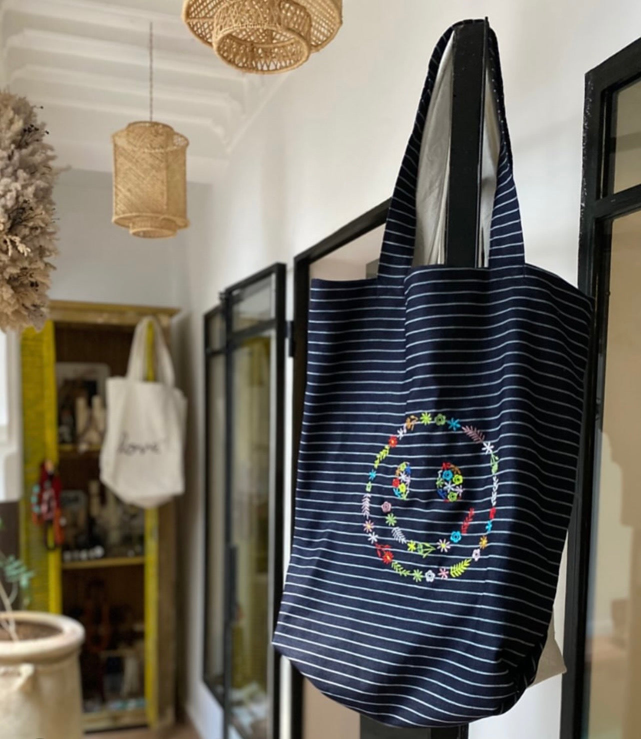 Navy striped handmade tote bag with colorful floral embroidery — Souhaib Creative Service Morocco