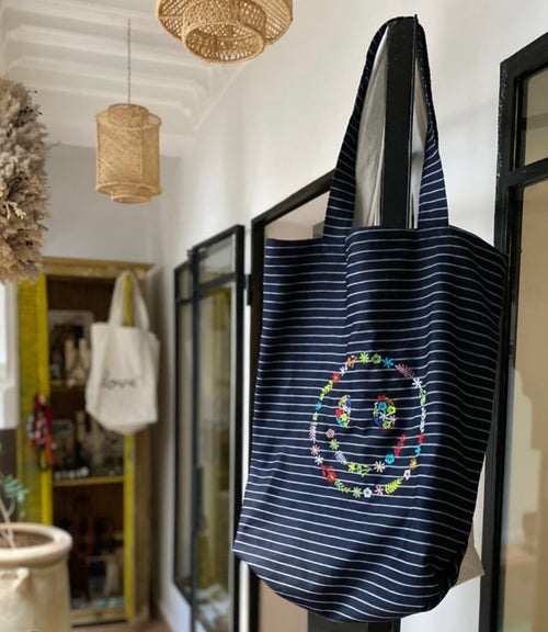 Navy striped handmade tote bag with colorful floral embroidery — Souhaib Creative Service Morocco