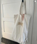White handmade palm fiber beach tote bag with gold palm embroidery — Souhaib Creative Service Morocco
